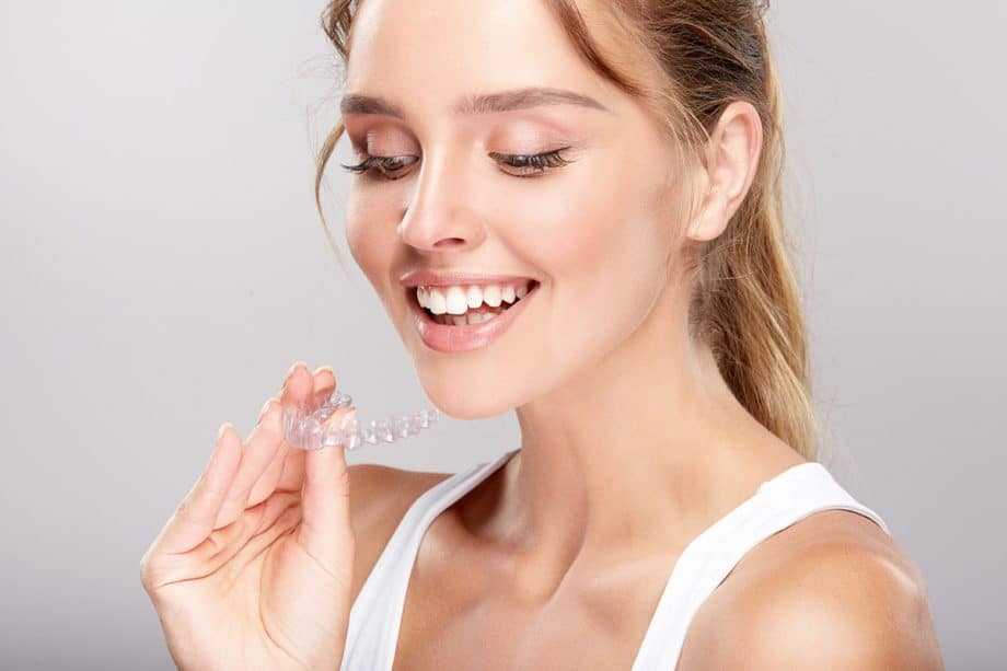 How Do You Clean Your Invisalign Trays & Retainers?